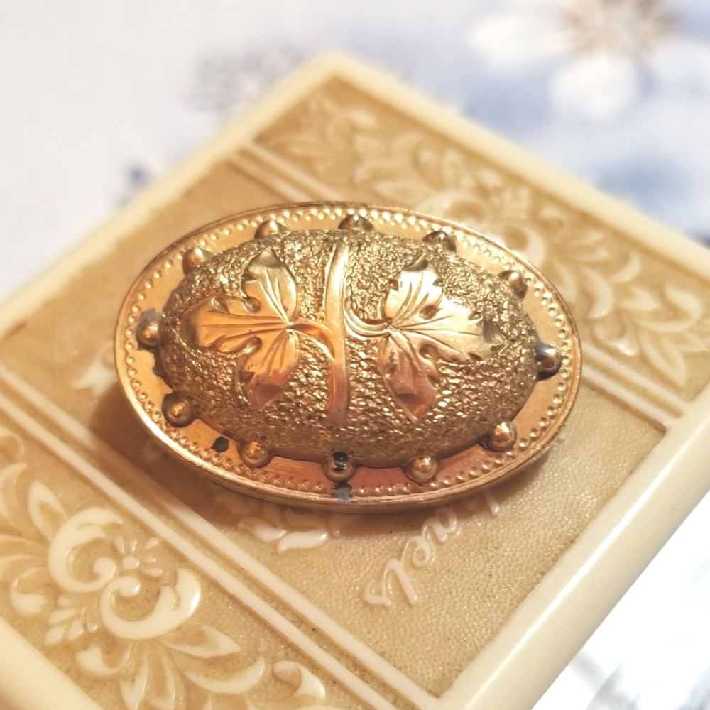 1870s Victorian Era Gold Filled Reppousse Brooch
